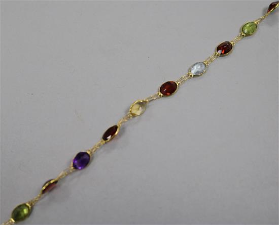 A 14ct gold and multi gem set bracelet, 18cm.